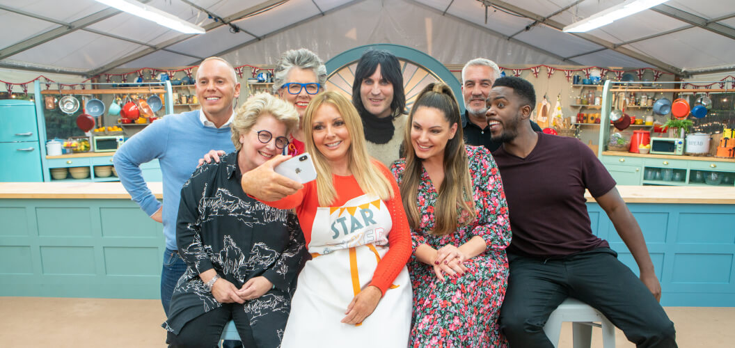 Star Baker Carol Vorderman taking a selfie with the other Bake Off celebs, hosts and judges