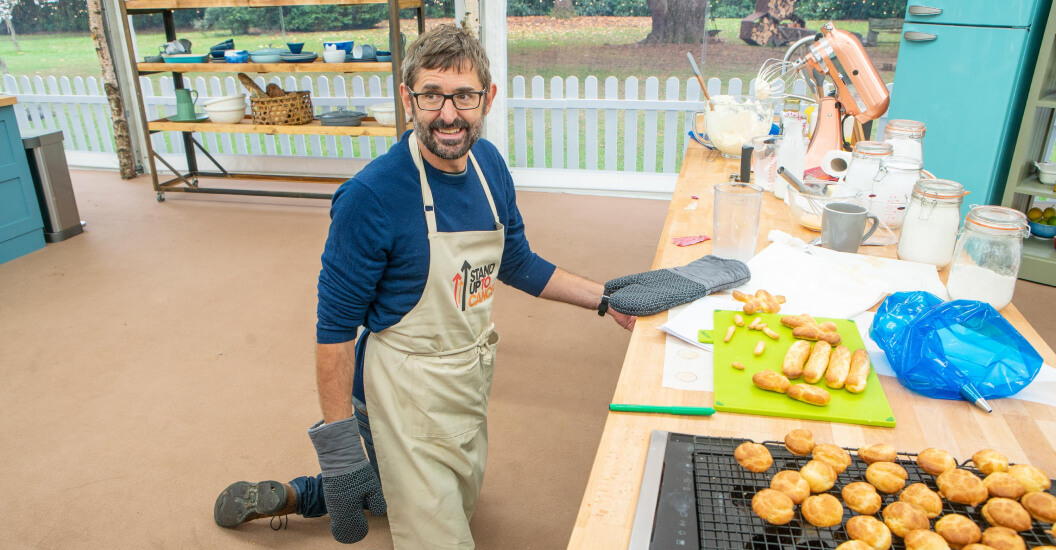 Louis Theroux on the floor in the Bake Off tent