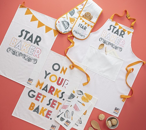 The Star Baker merchandise oven gloves, apron and tea towels